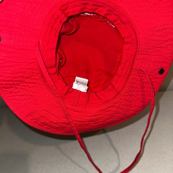 Coca-Cola bucket hat with a bottle opener attachment and an adjustable string - Picture 6 of 9
